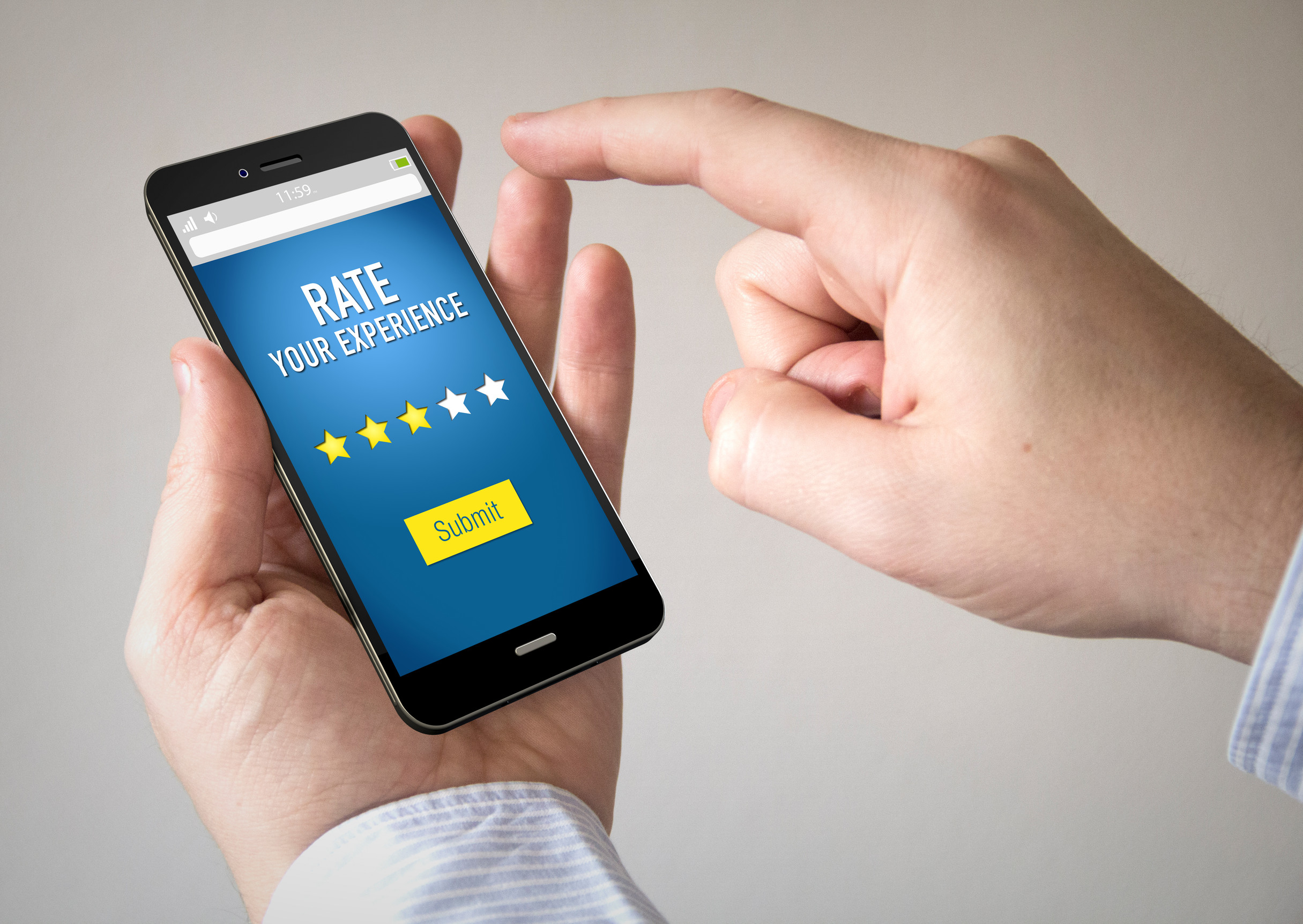 Review concept: Close up of man rating a experience with stars. All graphics on the screen are made up.