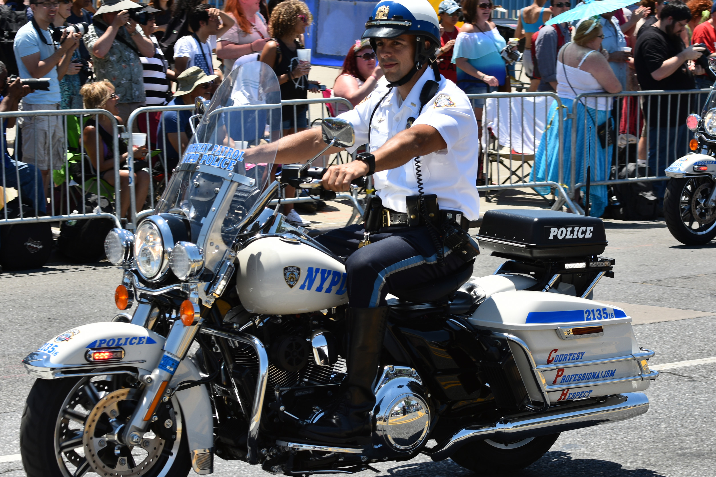 NEW YORK - JUNE 18, 2016: NYPD working during the 34th Annual Mermaid Parade at Coney Island, the largest art parade in the nation and a celebration of ancient mythology on June 18, 2016 in Brooklyn NY.